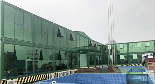 πολυτελή πράσινα δοχεία κτίριο σπίτι κτίριο γυάλινο σπίτι